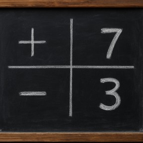 Chalkboard with point spreads and team scores illustrated