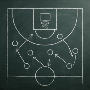 Chalkboard diagram showing man-to-man defensive basketball play