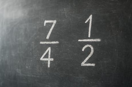 Example of fractional odds format on a chalkboard