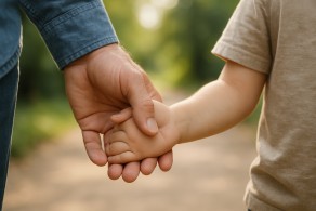 Illustration of guardian holding child’s hand for succession planning