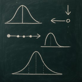 Hand-drawn diagram illustrating point spread concepts on a chalkboard