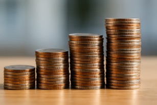 Stacks of coins showing different heights as a visual for varied outcomes