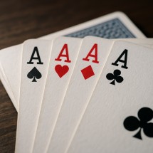 Playing cards showing a winning hand to illustrate probability formula in action